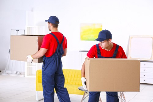 Removal team sorting recyclable items during a Paddington move