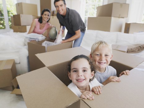 Office furniture and packed boxes prepared for a Paddington commercial move