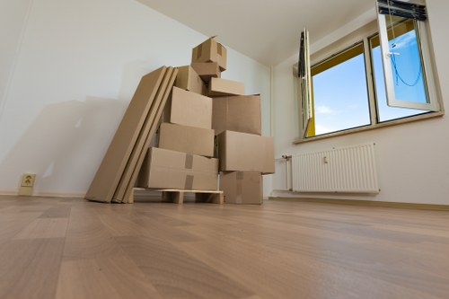 Removal van and moving boxes during a professional service