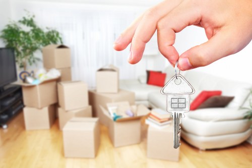 Professional movers handling boxes carefully
