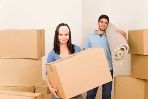Team using careful lifting techniques during a move