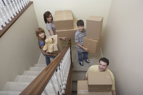 Local moving team navigating a Paddington street with student belongings
